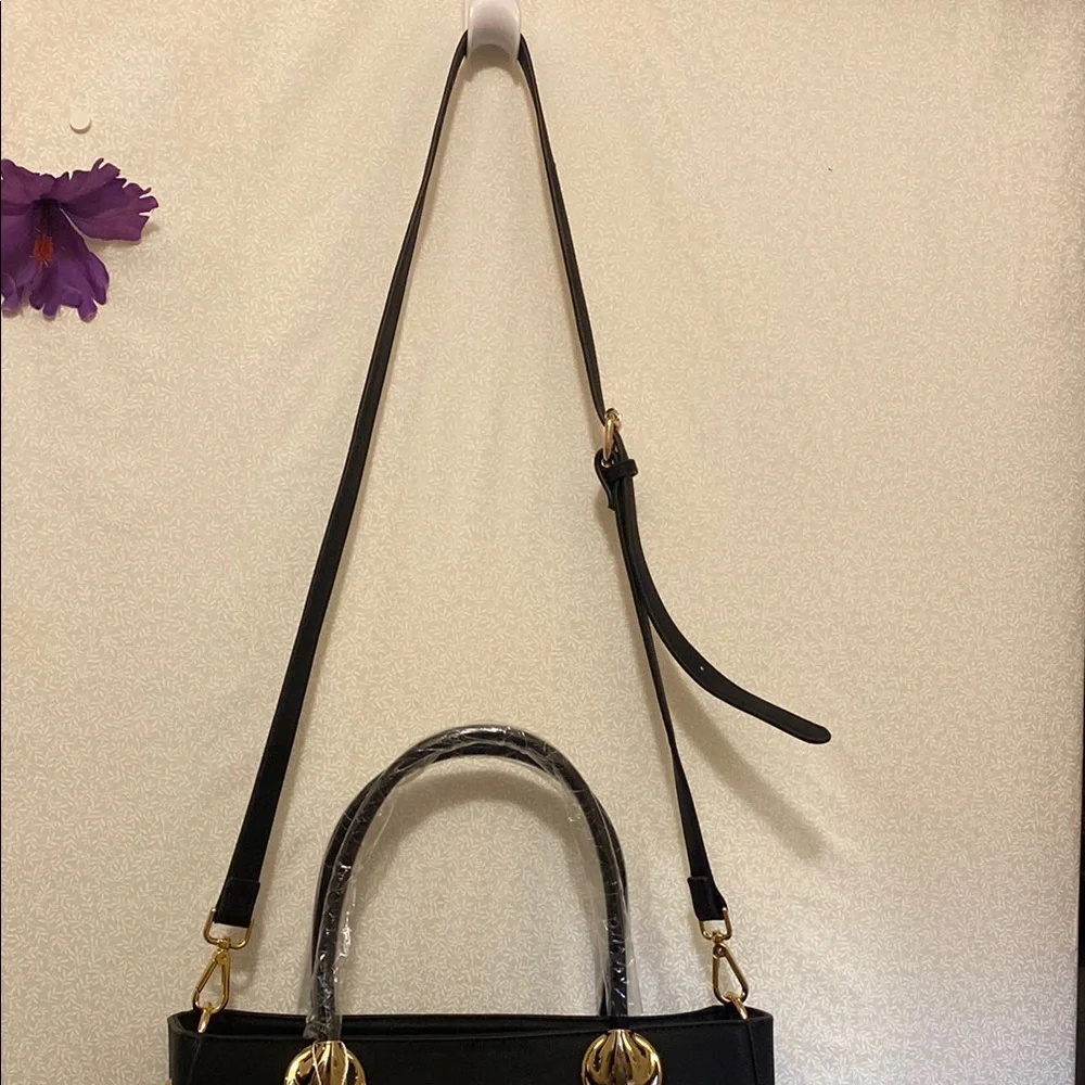 Elegant Black Handbag with Gold Accents